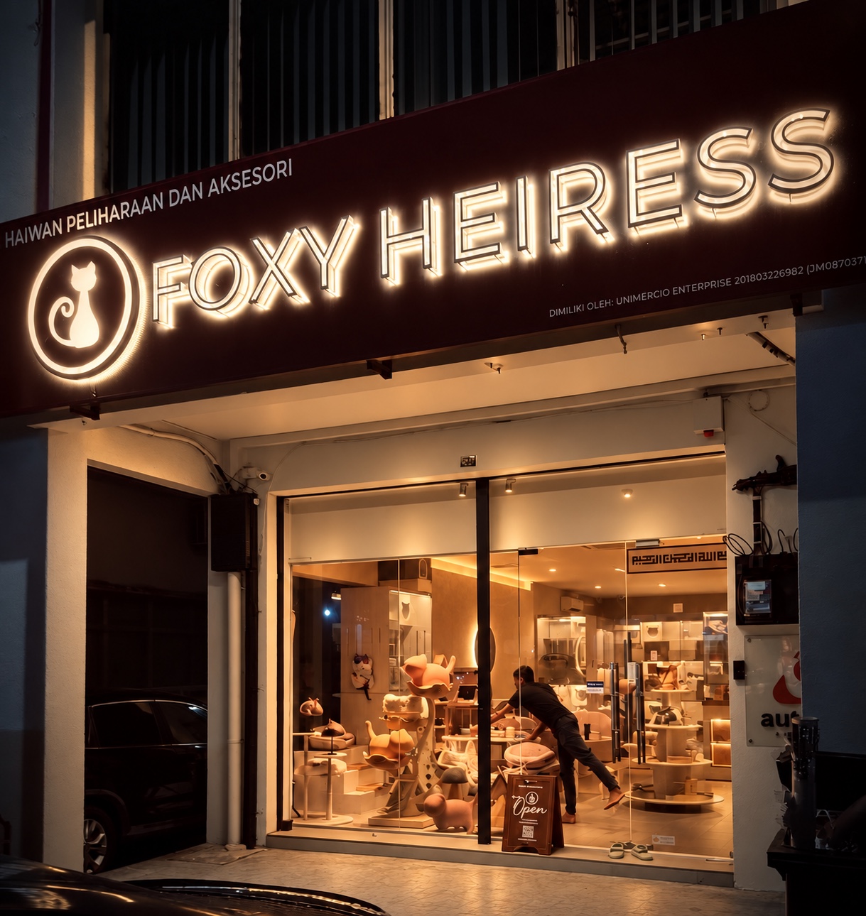 Foxy Heiress illuminated storefront at night